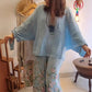 Damen-Set aus locker sitzender Bluse und weit geschnittener Hose mit Blumenprint